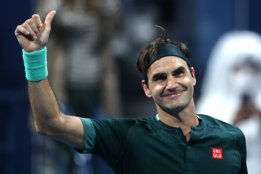 Roger Federer of Switzerland celebrates winning his match against Dan Evans of Great Britain on Day 3 of the Qatar ExxonMobil Open in 2021