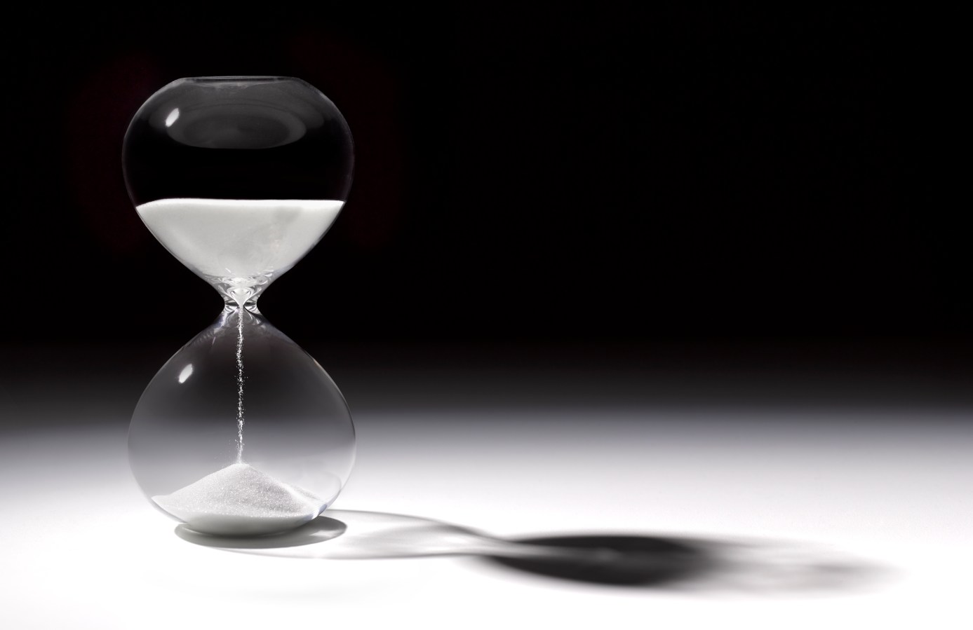 Hourglass dropping sand to display time passing