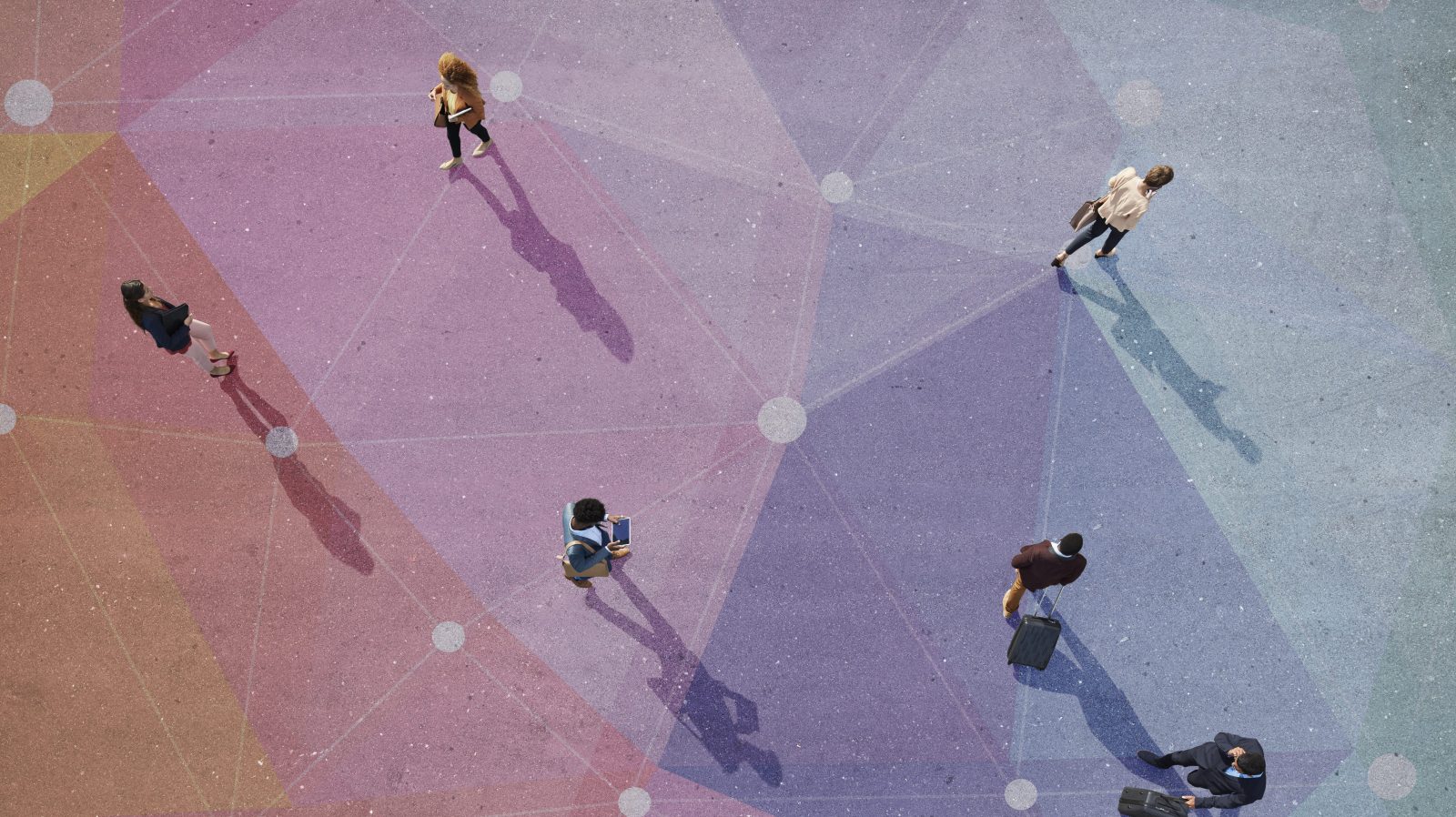 Group of young adults, photographed from above, on various painted tarmac surface, at sunrise.