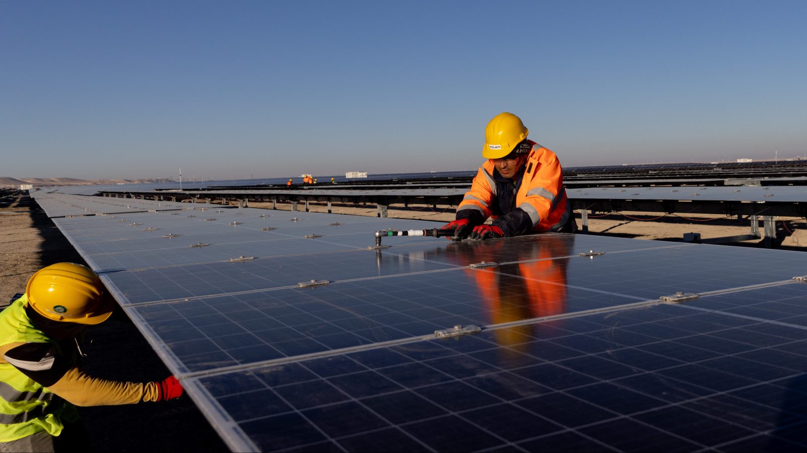 Solar panels being installed by wrokers