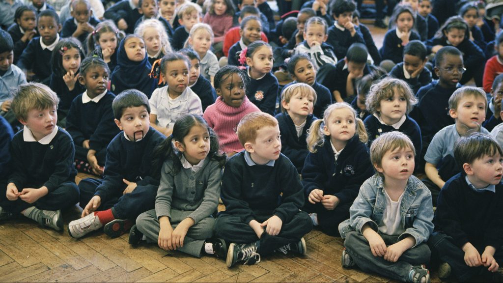 Future leaders listen to a story at school