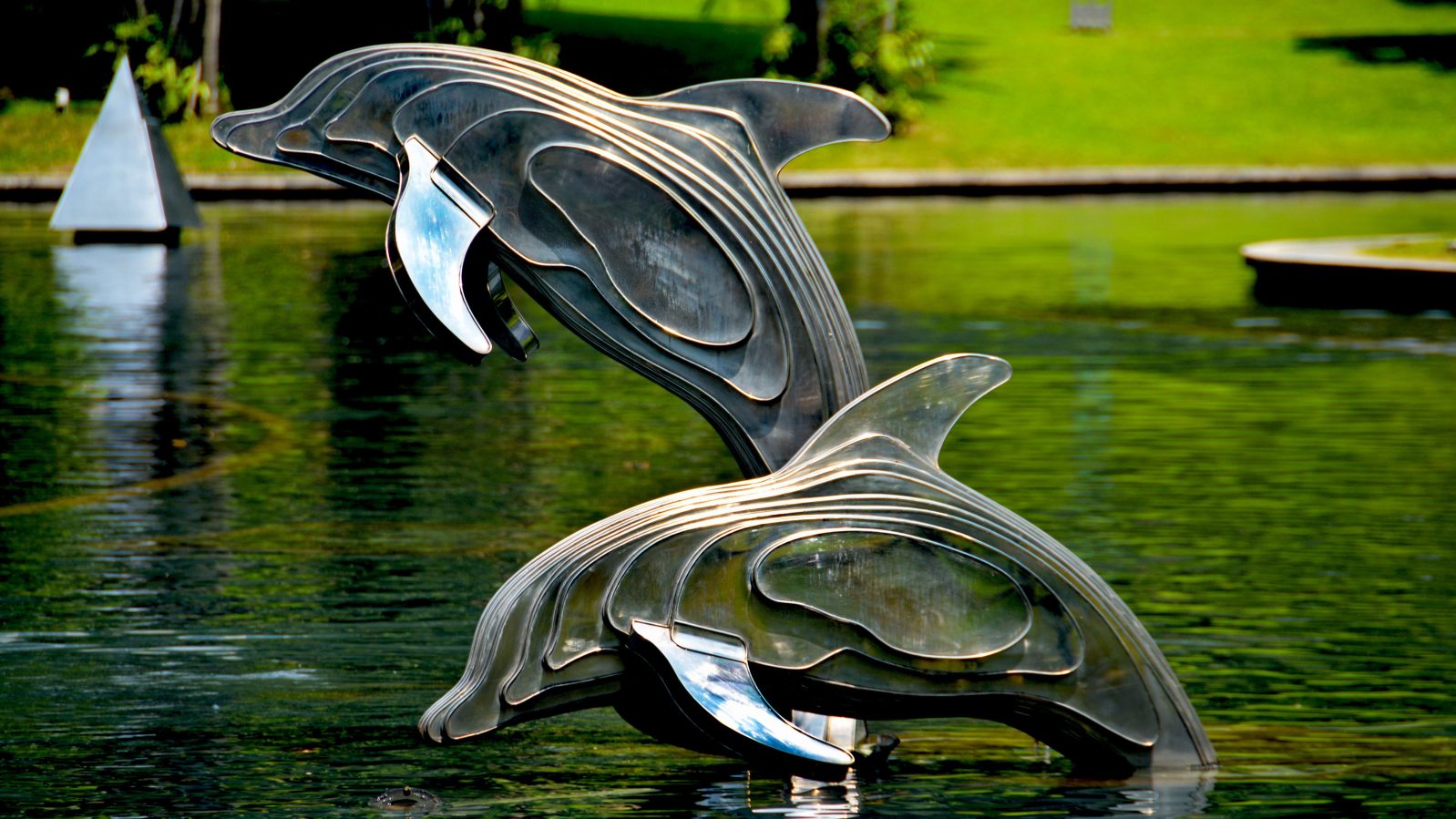 Dolphin sculptures leaping in a fountain