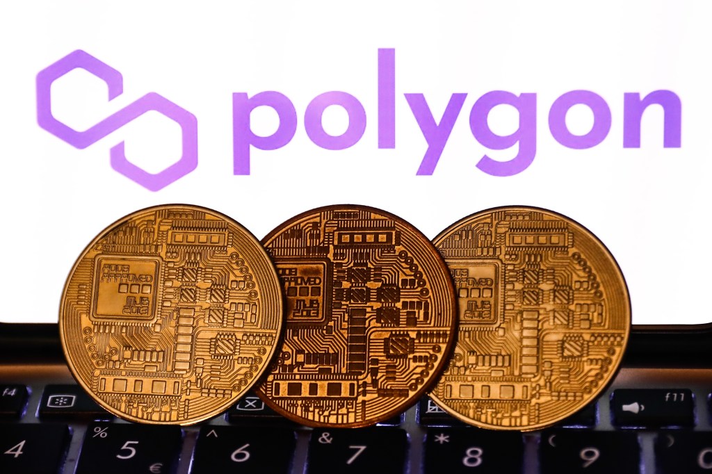 Polygon logo displayed on a phone screen and representation of cryptocurrency are seen in this illustration photo taken in Krakow, Poland on November 6, 2021. | Photo by Jakub Porzycki/NurPhoto via Getty Images