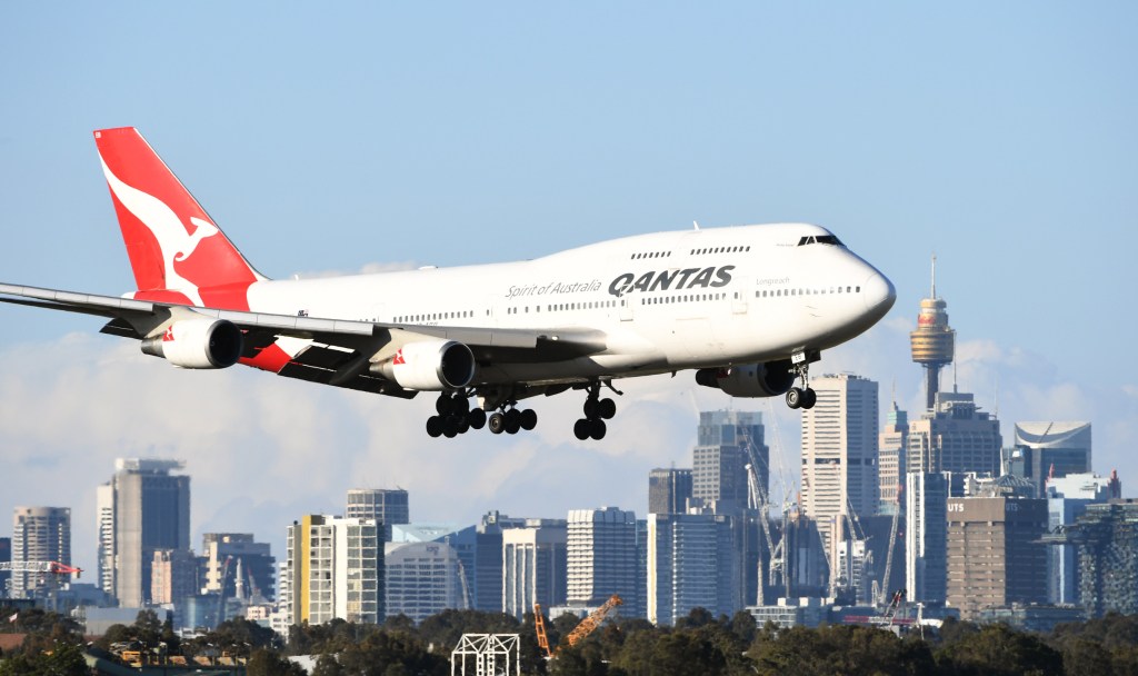 SYDNEY, AUSTRALIA - SEPTEMBER 30:  Qantas flight number 4 from Honolulu, a Boeing 747-400 aircraft arrives at Sydney Airport on September 30, 2018 in Sydney, Australia. The Boeing 747, the "Jumbo Jet" celebrates its 50th birthday today having first rolled out of its custom-built assembly plant in Everett, Washington, USA on September 30th, 1968. The "Queen of the Skies" as she is affectionately called has been a favourite aircraft of millions of passengers for her entire flying life.  (Photo by James D. Morgan/Getty Images)
