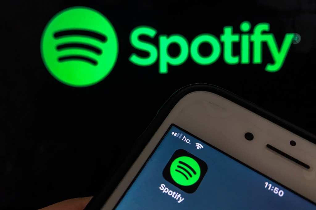 Spotify pilots AI voice translation for podcasts