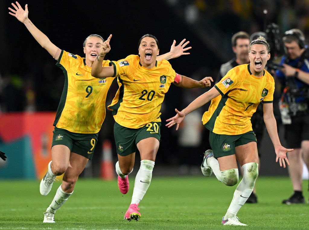 BRISBANE, AUSTRALIA - AUGUST 12: Sam Kerr, Caitlin Foord and Steph Catley of Australia celebrate the team’s victory through the penalty shoot out following the FIFA Women's World Cup Australia & New Zealand 2023 Quarter Final match between Australia and France at Brisbane Stadium on August 12, 2023 in Brisbane, Australia. (Photo by Quinn Rooney/Getty Images )