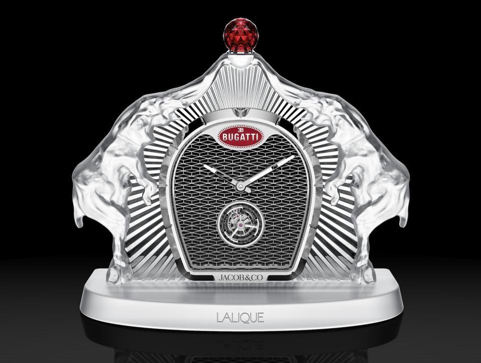 The Bugatti Calandre Table Clock combines the heritage and artisan knowhow of the three luxury brands, translating a century of Bugatti design into an intricate timepiece