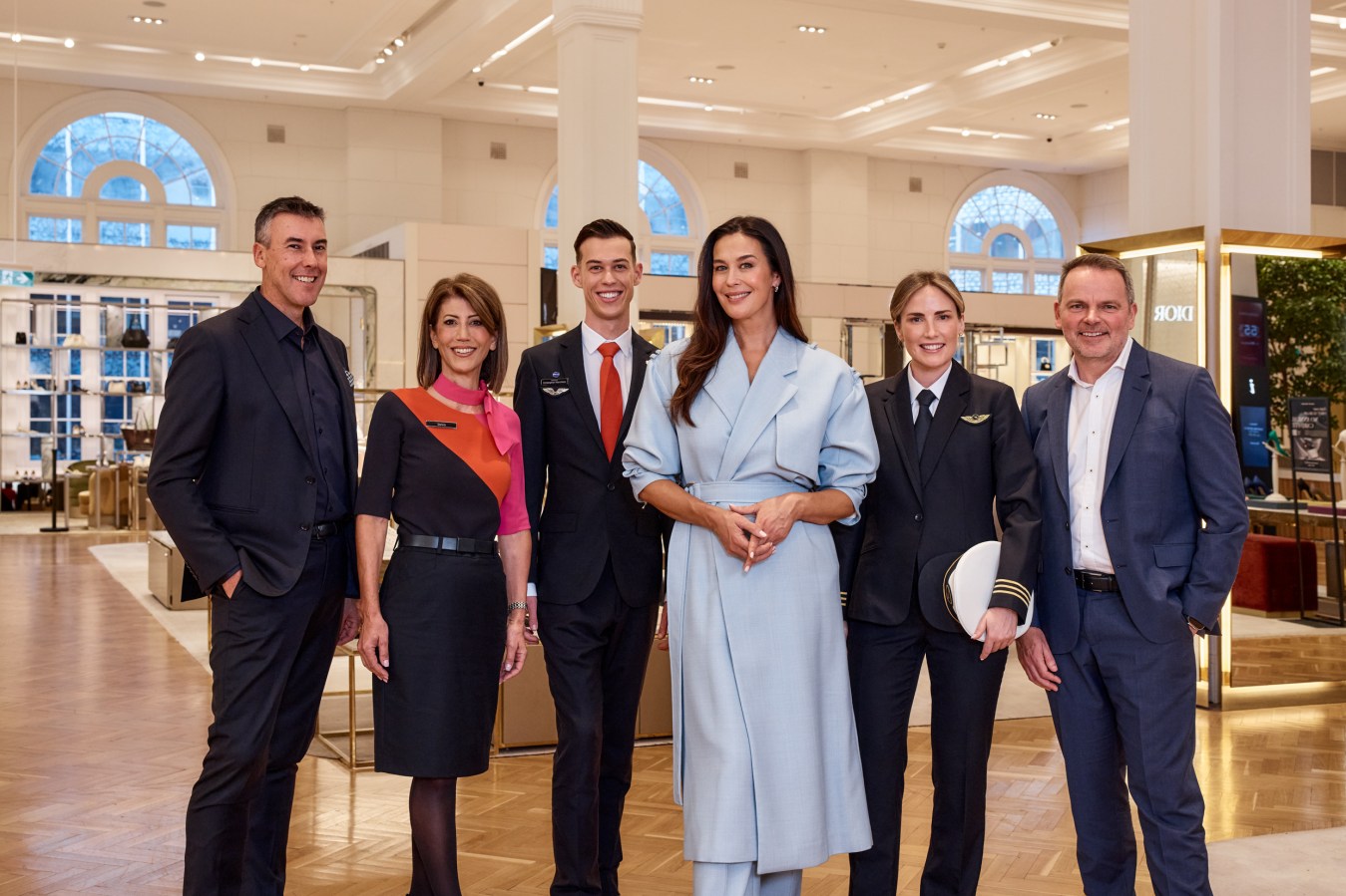 Andrew Glance, Scott Fyfe, Megan Gale and Qantas crew