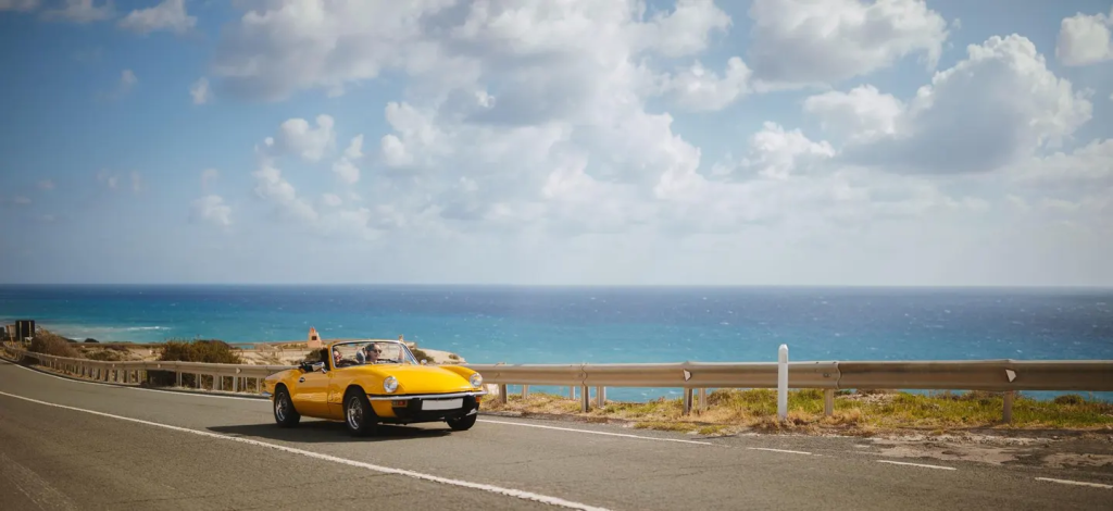 A coastal road in Cyprus overlooking the sea. Local authorities are enforcing little-known driving rules—like banning eating or drinking (even water) behind the wheel—with fines for violations.
getty