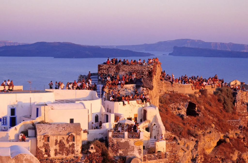 Sunset crowds in Kastro, Oia. With visitor numbers surging, Greece is capping cruise ship arrivals and introducing new tourist fees to help ease overtourism on islands like Santorini.
getty
