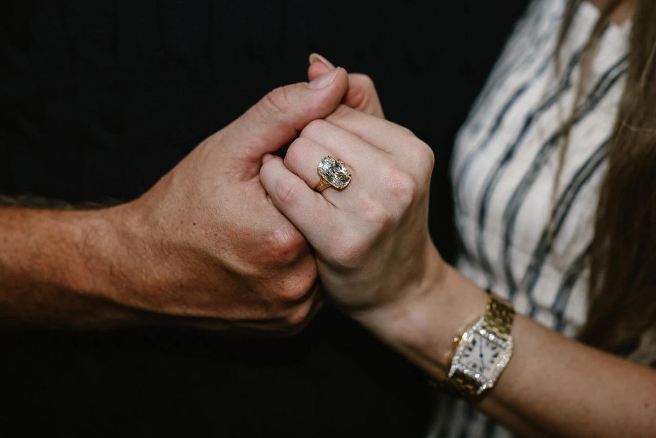Swift on Tuesday announced she was engaged to her boyfriend of two years in a post that included photos of the couple embracing in a garden and a close-up of a ring gemologist appraiser Deborah Villepigue says looks to feature a diamond between 10 and 15 carats. The stone is an antique cushion-cut diamond with a D color grade—the highest on the scale—and likely a clarity of VVS1 or better, she said, in a yellow gold vintage setting with an estimated total value of about $650,000. Villepigue explained that because the diamond appears to be an antique, it is likely heavier and has a higher carat weight than a similarly sized diamond if it were cut today. She said it’s very possible the stone has a carat weight of 13—a number of significance to Swift that she has referenced dozens of times in her career (fans have already noticed her engagement announcement came on the 26th—13+13—and 13 days after her record-breaking appearance on Kelce’s podcast “New Heights,” which took place Aug. 13). Swift was also wearing what appeared to be a diamond-studded Cartier Santos Demoisells watch for the proposal, similar styles of which resell for upwards of $15,000.