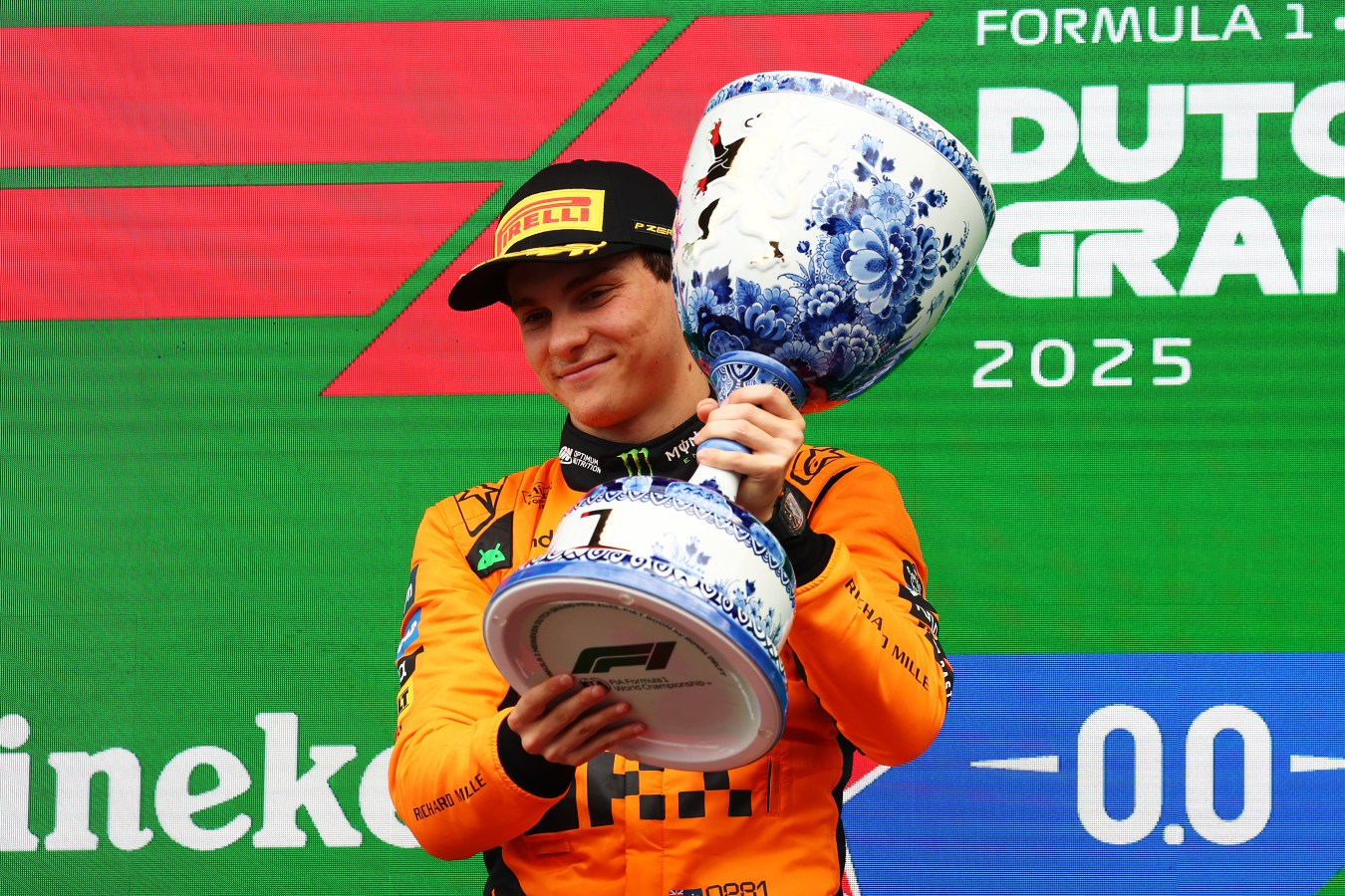 ZANDVOORT, NETHERLANDS - AUGUST 31: Race winner Oscar Piastri of Australia and McLaren celebrates on the podium during the F1 Grand Prix of Netherlands at Circuit Zandvoort on August 31, 2025 in Zandvoort, Netherlands. (Photo by Clive Rose/Getty Images)