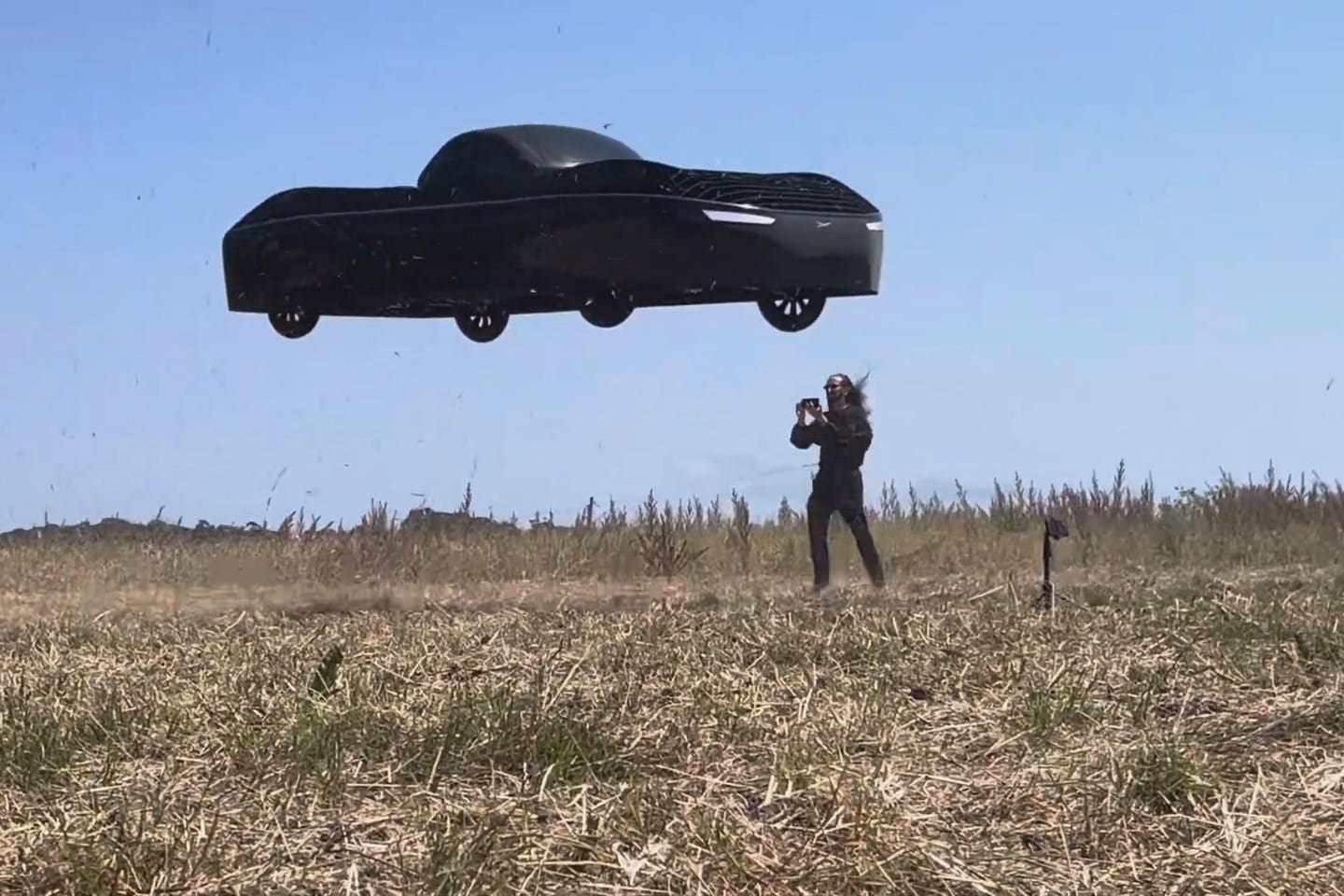 Jim Dukhovny CEO of Alef near the flying car during a flight test